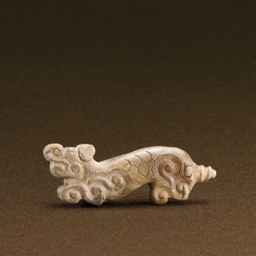 A JADE 'TIGER' PENDANT